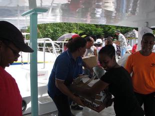 Image #21 - Hurricane Tomas Relief Effort (Packing the goods)
